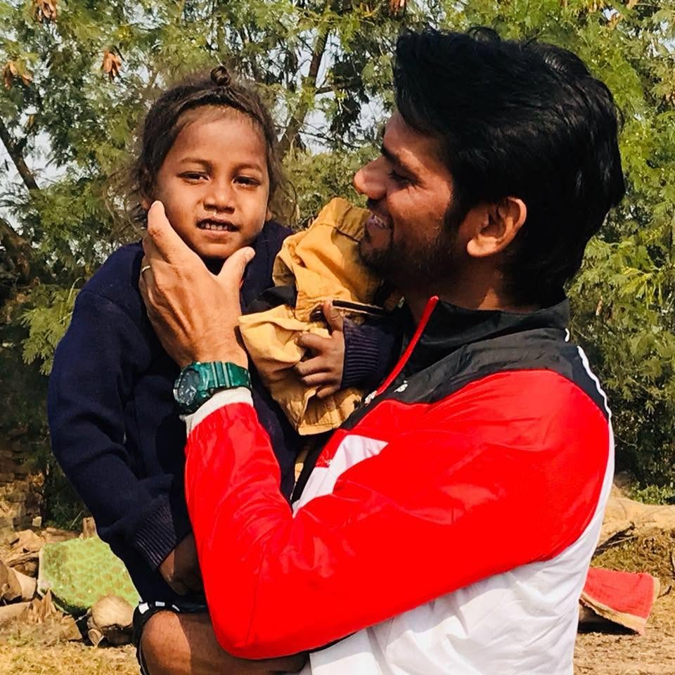 A moment with a child in the field